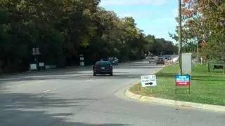 Loud Mustang drifts and almost crashes into curb