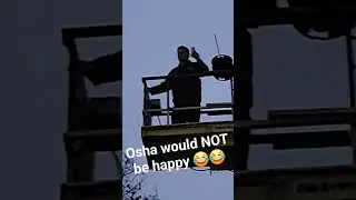 Joe drinking on the scissorlift while putting Christmas lights up. 