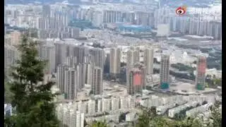 В Китае решили радикально бороться с недостроенными высотками и подорвали сразу 15 небоскрёбов