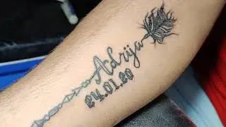 Arrow with name tattoos