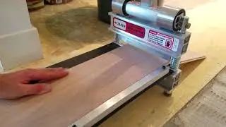 Installing glue down engineered hardwood