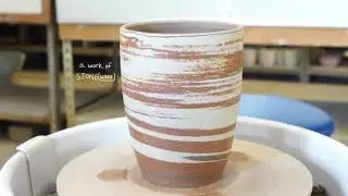 Throwing a planter on a potters wheel with three different clays