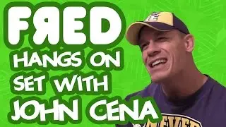 Fred hangs on set with John Cena