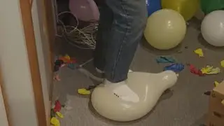 Balloon stomping with socks and barefeet.  s2p
