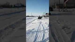 Расчистка снега на квадроцикле