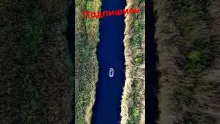 Красивая река. Природа. На лодке в плавни.