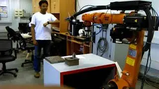 Controlling KUKA KR5 robotic Manipulator with TI Chronos watch at IIT Delhi