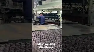 Mesh panels welded by machine.