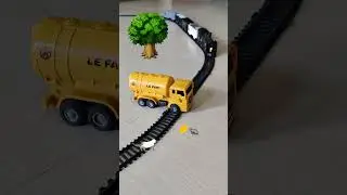 Oil tanker truck is stuck near the railway track and frieght train is approaching fast | Rail King