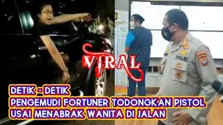 PENGEMUDI MOBIL FORTUNER TODONGKAN PISTOL SETELAH MENABRAK