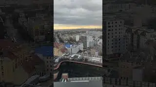 город