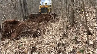 Bulldozer clearing land