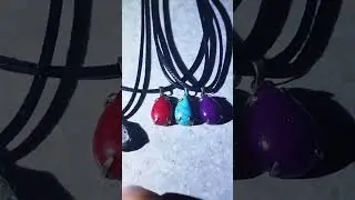 кулоны с полудрагоценными и драгоценными камнями тигровый глаз, родонит, бирюза и аметист.