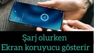 Telefonunuz şarj olurken ekran otomatik olarak kapandıktan sonra bir ekran koruyucu gösterir.