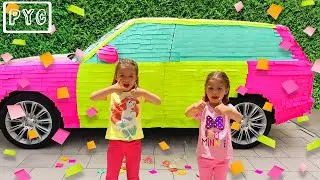 Майя и Адель украсили машину мамы разноцветными стикерами