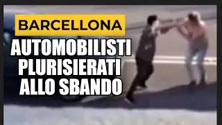 BARCELLONA, SPAGNA: AUTOMOBILISTI FANNO A BOTTE IN STRADA