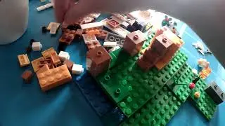Assembling Minecraft Lego chicken set 21140
