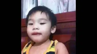 Baba eating push pop