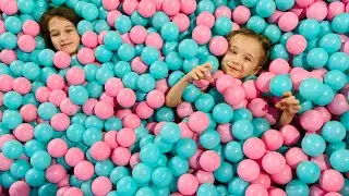 Polina and Dasha play at the learning center for Children