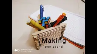 making an pen stand with ice cream sticks