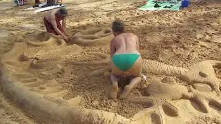 Creating Little Beach Sand Art on Maui