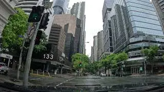 Drive: rain-drenched streets of Brisbane