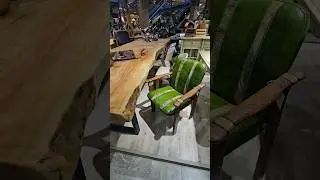 Этот огромный стол из слэба и 12 таких полукресел стоят около 3 млн. рублей 