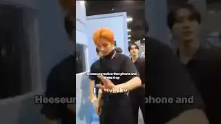 Heeseung helping engene to pick up her phone 