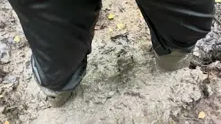 Rubberboots / wellies and leather pants in deep sloppy mud