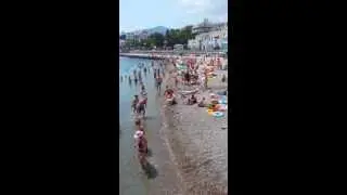 Municipal Beach in Yalta, Crimea - Beautiful Girl Approaching