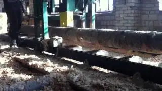 Станки для производства оцилиндрованных бревен