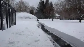Snowblower with impeller pads throws a long clean stream of snow