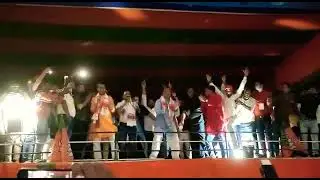 Hemanta biswas Sharma dancing on the stage with HOJai's MLA Ramakrishna Ghosh