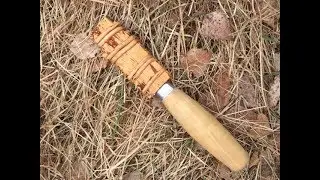 Birchbark sheath and fire starting struggle