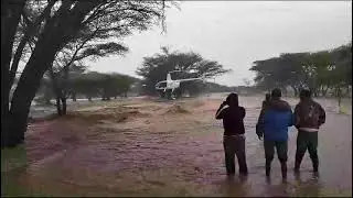 Helicopter Rescues Driver Caught by Flash Floods