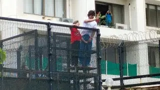 Shah Rukh Khan And AbRam Khan wish Eid Mubarak to Fans Gathered Outside Mannat