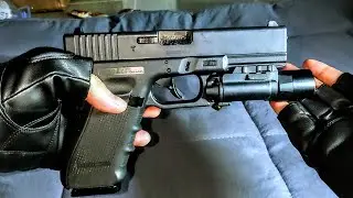 Mulifang Glock 17 Gen 4 laser shell ejecting toy gun overview.