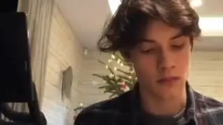 Louis Partridge showing his incredible talent at playing the piano.