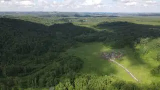 Вид на просторные поля и леса