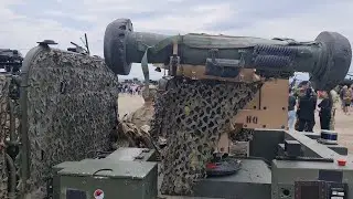 Javelin ATGM on carrier vehicle and surveillance drone for targeting