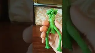 высокий Виктор из пластилина.