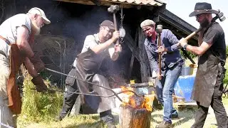 Hamerslagdag,  Blacksmith festival around windmill.