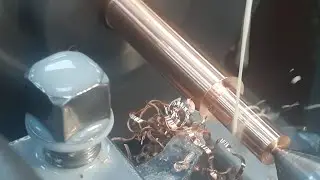 Turner: making a product from a copper bar on a 1K62 lathe