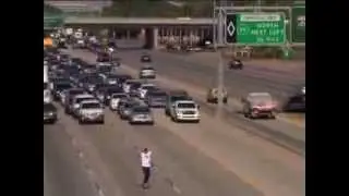 Skateboarder seizes the 405 Freeway!! Yeah Baby!