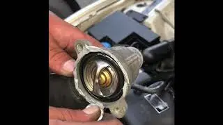 How to replace thermostat on Jaguar S type