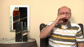 german man drinks whisky