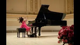 Emmie Guo (8) performs at Carnegie's Stern Auditorium Perelman Stage