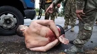 Шокирующие кадры издевательств над украинскими пленными.