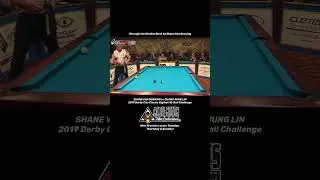 Shane Van Boening goes through a small window for the 10 foot bank shot.