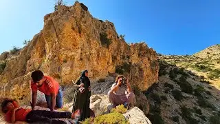The search of a nomadic family to find sheep among the mountains and rocks